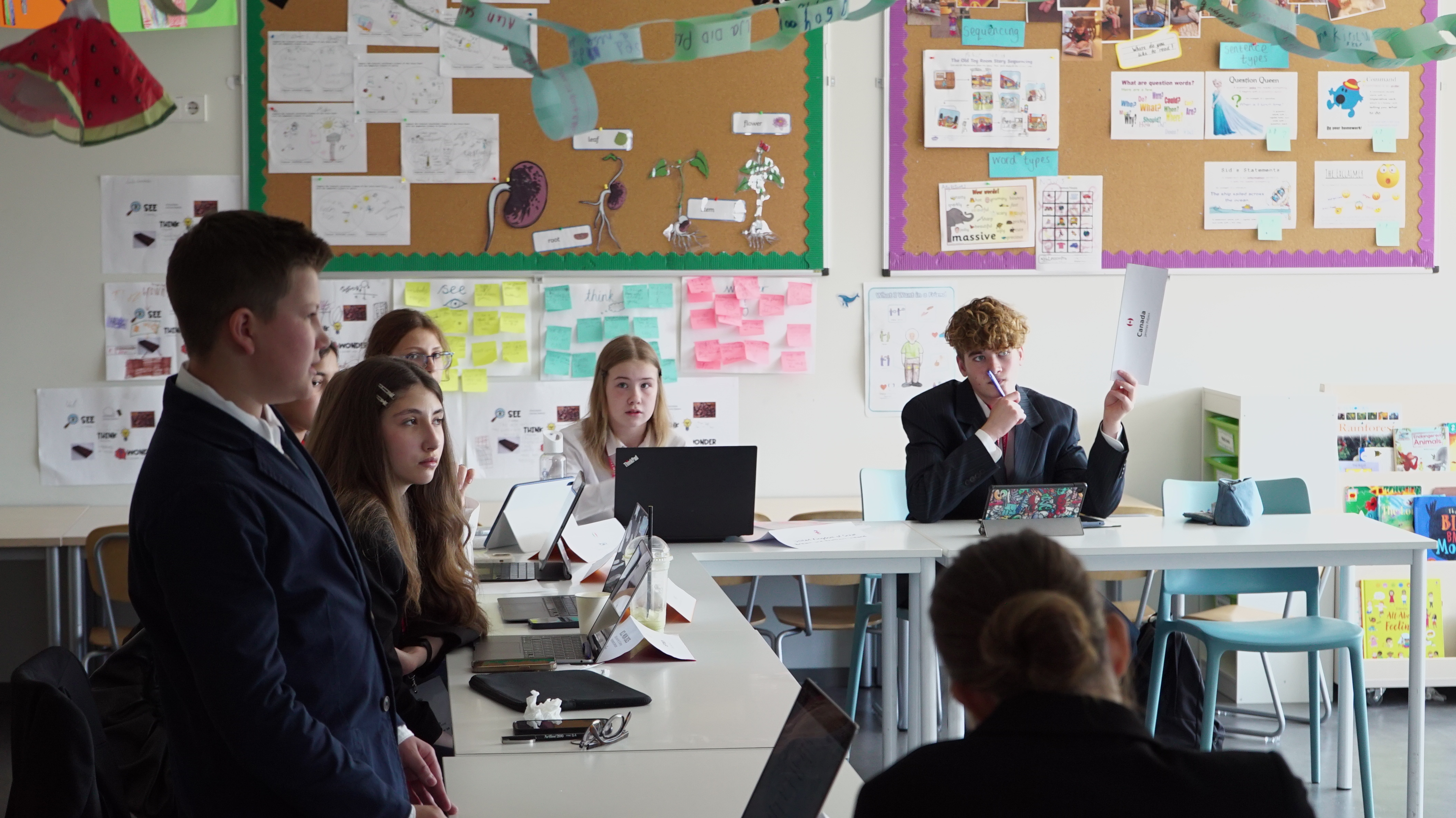 Delegates exchanging ideas in committee