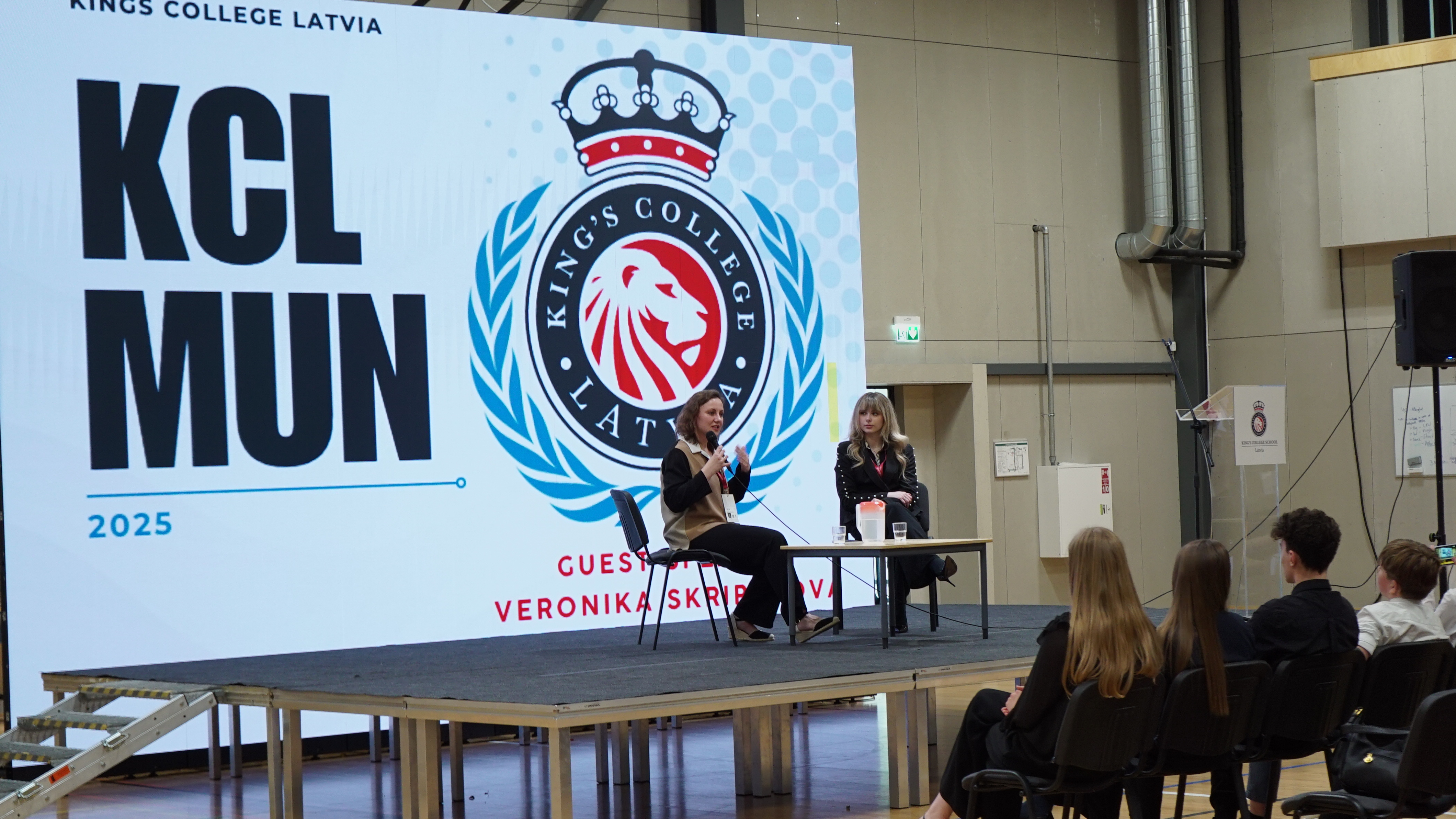 Delegates posing together between sessions